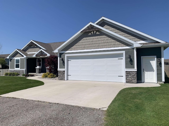 7272 S 7 Mile Rd, Freeland, MI 48623 - craftsman-style home featuring stone siding, driveway, and a front lawn