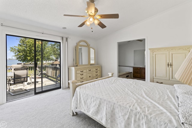 bedroom with vaulted ceiling, access to outside, carpet floors, and ceiling fan