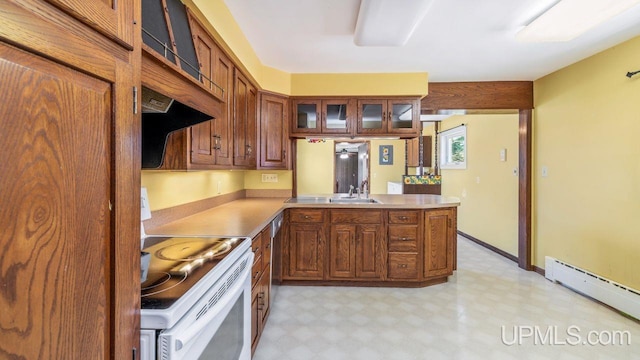 606 S 13th St, Gladstone, MI 49837 - kitchen with electric range, light flooring, baseboard heating, light countertops, and glass insert cabinets