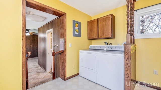 606 S 13th St, Gladstone, MI 49837 - washroom with cabinet space, washing machine and dryer, baseboards, and light flooring