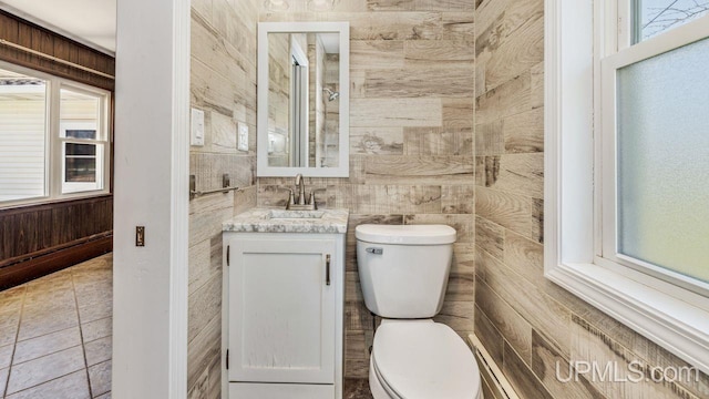 606 S 13th St, Gladstone, MI 49837 - bathroom with toilet and vanity
