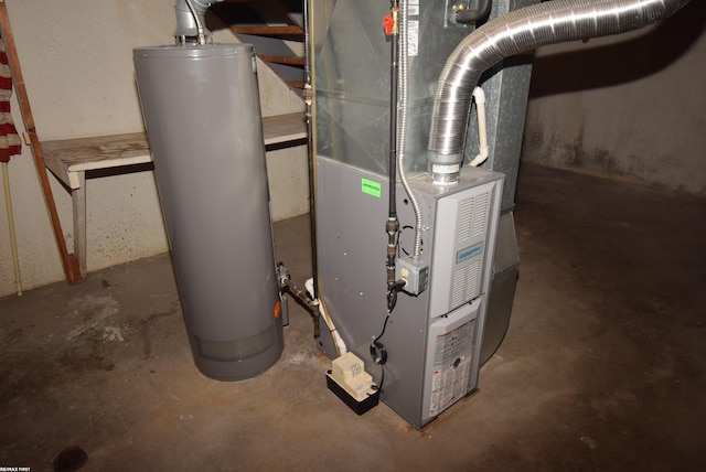 utility room with water heater and heating unit