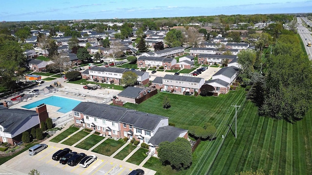 view of property location featuring a pool area