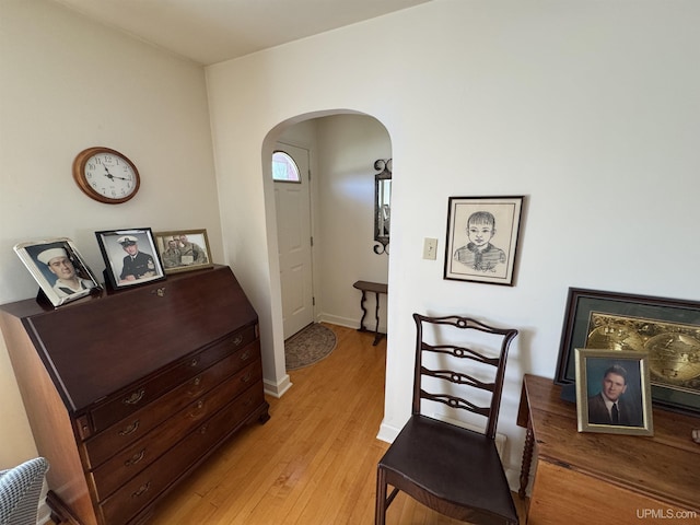 1100 Poplar Ave, Crystal Falls, MI 49920 - interior space featuring arched walkways and light wood-style floors