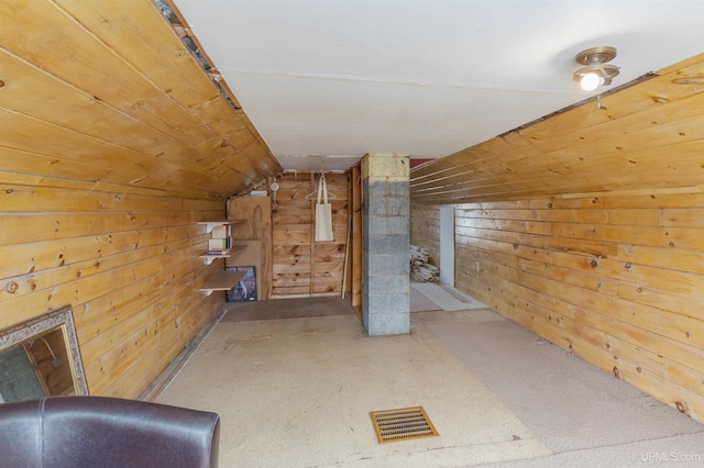 739 N 6th Ave, Iron River, MI 49935 - additional living space with vaulted ceiling and wooden walls