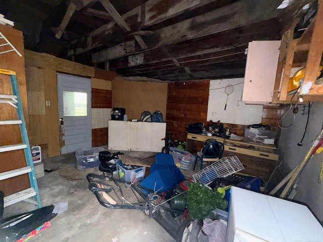 306 N Ionia St, Gladwin, MI 48624 - basement featuring wood walls
