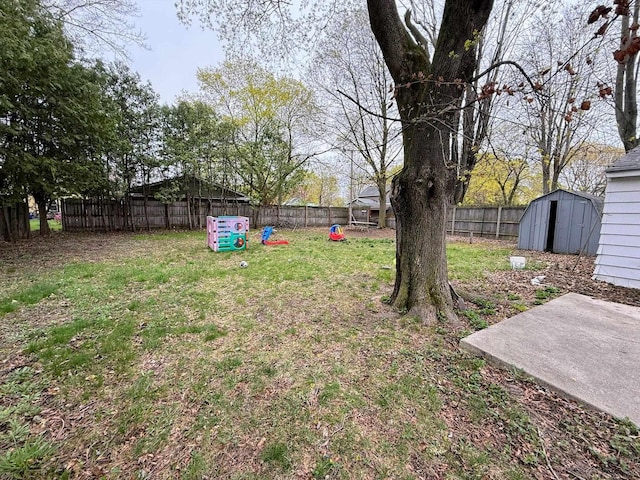 306 N Ionia St, Gladwin, MI 48624 - view of yard featuring a storage unit and an outdoor structure