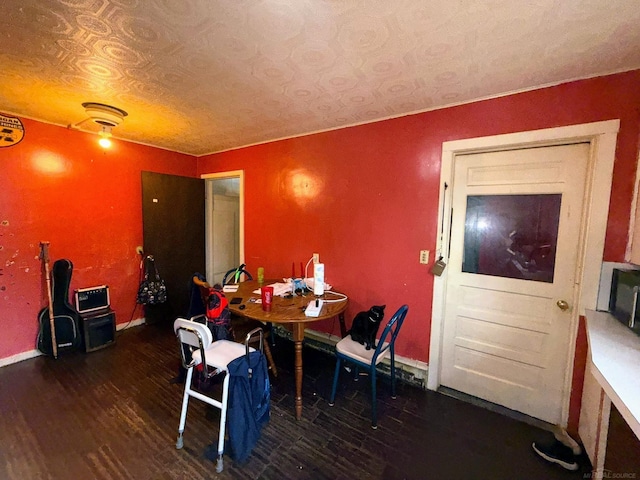 306 N Ionia St, Gladwin, MI 48624 - dining area with wood finished floors and baseboards