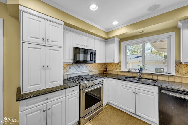 kitchen featuring black appliances, a sink, recessed lighting, crown molding, and white cabinetry