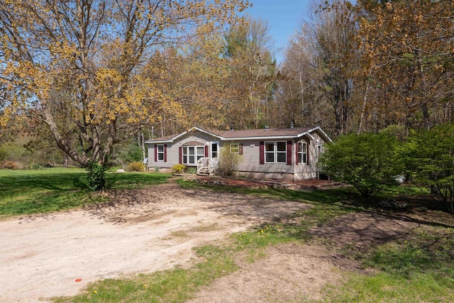 1448 W Sian Dr, Sanford, MI 48657 - manufactured / mobile home with dirt driveway