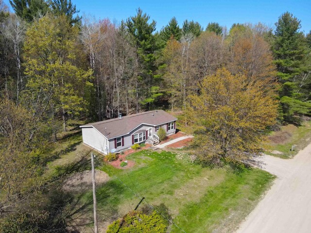 1448 W Sian Dr, Sanford, MI 48657 - view from above of property featuring a forest