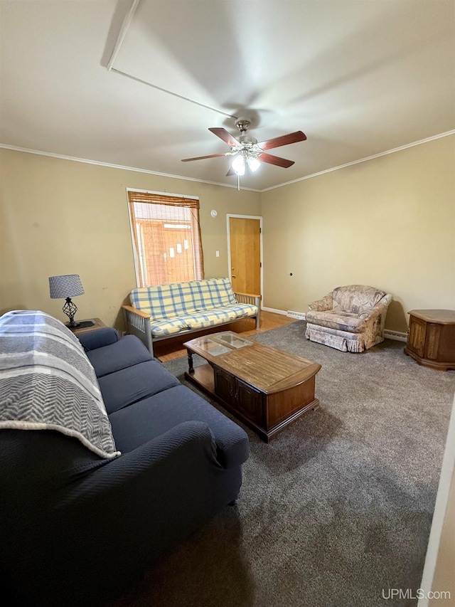 living room with carpet, a ceiling fan, baseboards, and ornamental molding