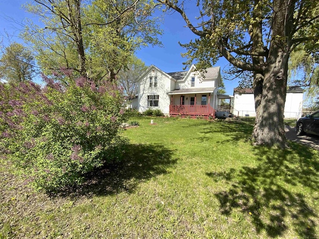 6053 Van Dyke Rd, Brown City, MI 48416 - view of green lawn featuring a deck