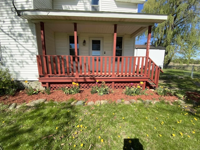 6053 Van Dyke Rd, Brown City, MI 48416 - property entrance featuring a porch and fence