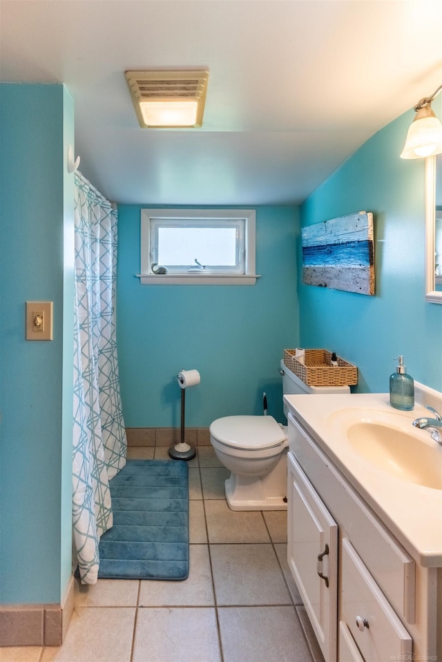 410 E Nicol Rd, Sandusky, MI 48471 - bathroom featuring toilet, tile patterned floors, vanity, and a shower with shower curtain