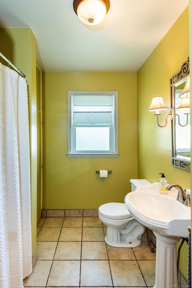 410 E Nicol Rd, Sandusky, MI 48471 - bathroom with toilet, tile patterned flooring, a shower with curtain, and baseboards