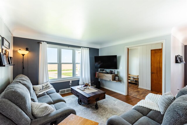 410 E Nicol Rd, Sandusky, MI 48471 - living room featuring wood finished floors and baseboards