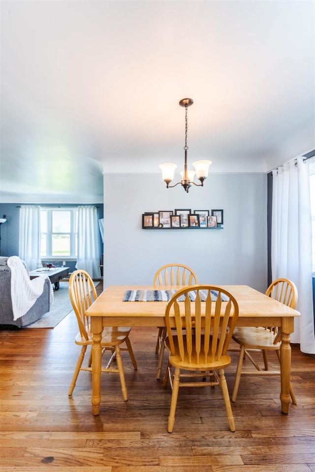 410 E Nicol Rd, Sandusky, MI 48471 - dining area with a chandelier and wood finished floors