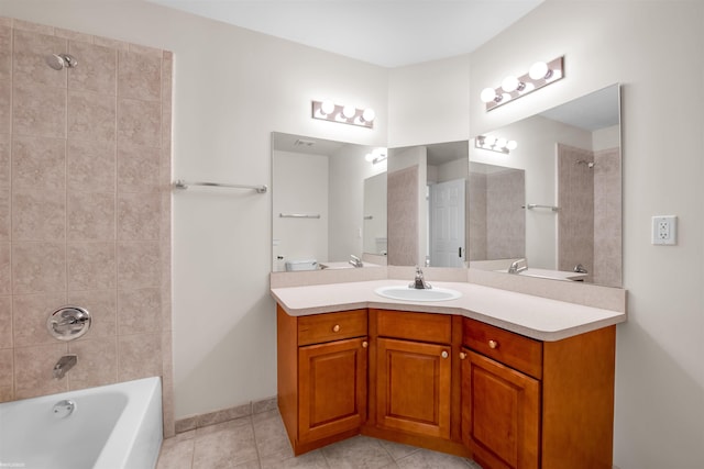 full bath featuring shower / washtub combination, tile patterned flooring, and vanity