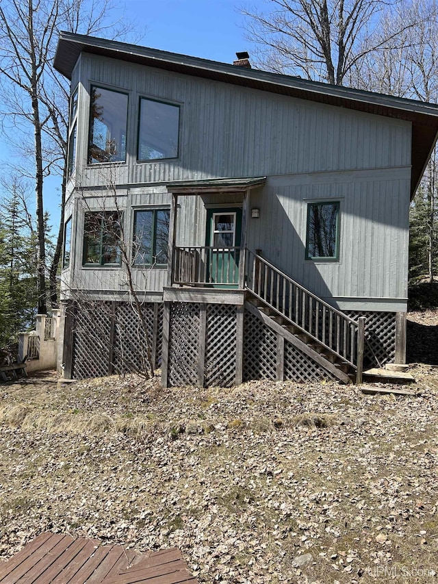 25393 Campsite Dr, Michigamme, MI 49861 - back of house with stairway