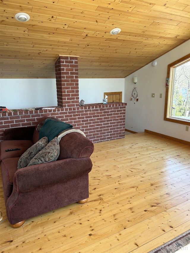 25393 Campsite Dr, Michigamme, MI 49861 - living room with hardwood / wood-style floors, wooden ceiling, lofted ceiling, and baseboards