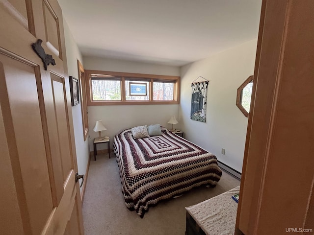 25393 Campsite Dr, Michigamme, MI 49861 - bedroom featuring a baseboard radiator and carpet floors