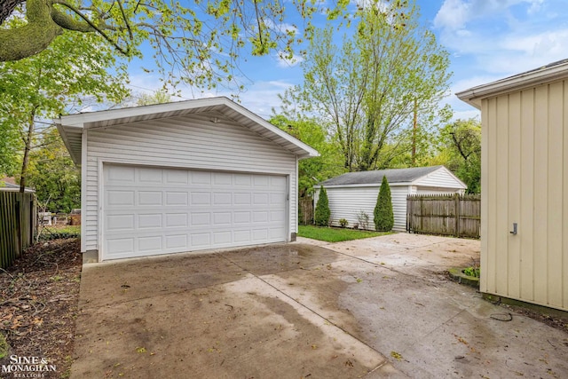 detached garage with fence