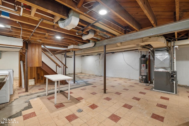 unfinished below grade area with water heater, heating unit, washer / clothes dryer, stairway, and light floors
