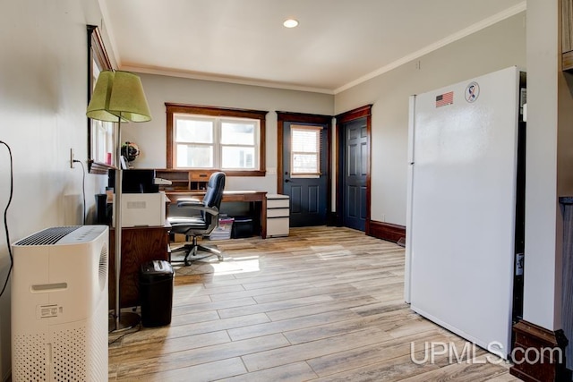 212 S 1st Ave, Escanaba, MI 49829 - home office featuring crown molding, light wood-style floors, and recessed lighting
