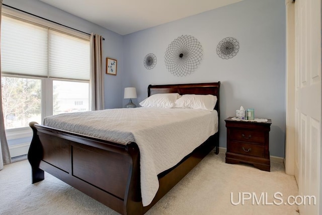 212 S 1st Ave, Escanaba, MI 49829 - bedroom featuring carpet and baseboards