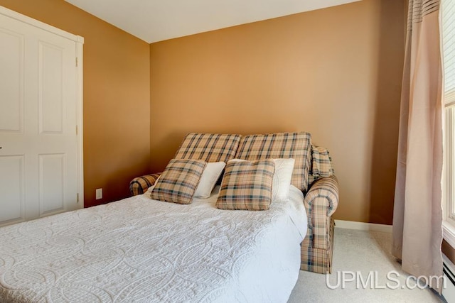 212 S 1st Ave, Escanaba, MI 49829 - bedroom with carpet and baseboards