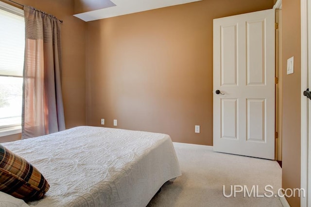 212 S 1st Ave, Escanaba, MI 49829 - bedroom featuring carpet
