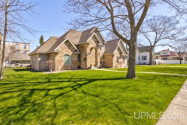 212 S 1st Ave, Escanaba, MI 49829 - view of front of home with stone siding