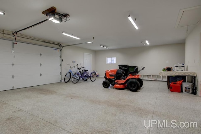 212 S 1st Ave, Escanaba, MI 49829 - garage with a garage door opener