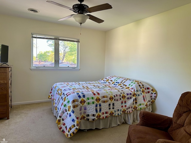 bedroom featuring carpet floors, baseboards, and ceiling fan
