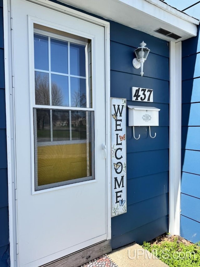437 N Main St, Lanse, MI 49946 - view of exterior entry