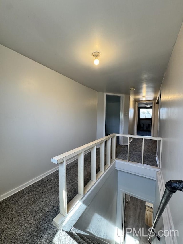 437 N Main St, Lanse, MI 49946 - staircase with baseboards