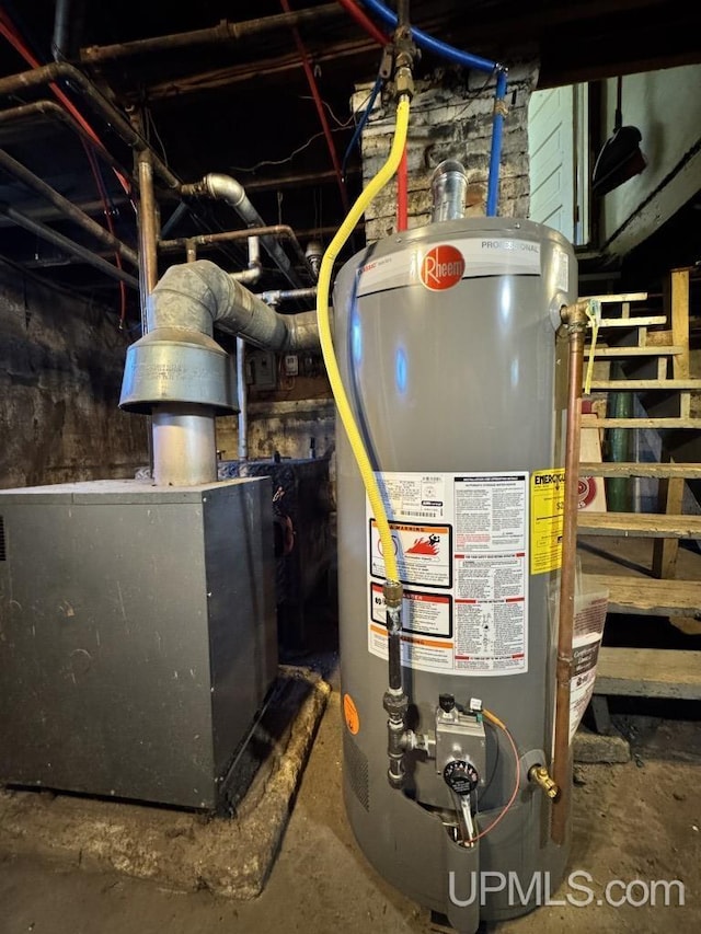 437 N Main St, Lanse, MI 49946 - utility room with gas water heater