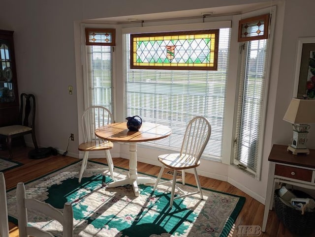 1726 Berkshire Dr, Gladwin, MI 48624 - dining space featuring wood finished floors and baseboards