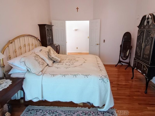 1726 Berkshire Dr, Gladwin, MI 48624 - bedroom featuring wood finished floors and baseboards