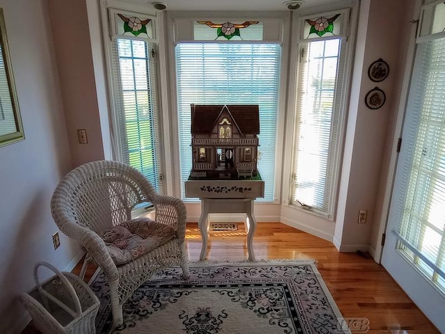 1726 Berkshire Dr, Gladwin, MI 48624 - sitting room featuring light wood-type flooring and baseboards