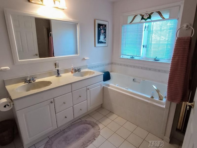 1726 Berkshire Dr, Gladwin, MI 48624 - bathroom featuring tile patterned flooring, a garden tub, and double vanity