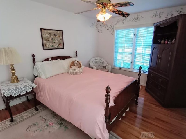 1726 Berkshire Dr, Gladwin, MI 48624 - bedroom featuring wood finished floors and ceiling fan