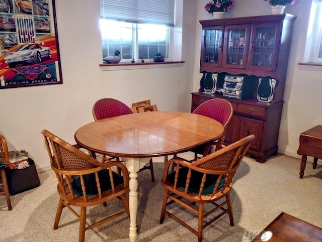 1726 Berkshire Dr, Gladwin, MI 48624 - dining room featuring light carpet