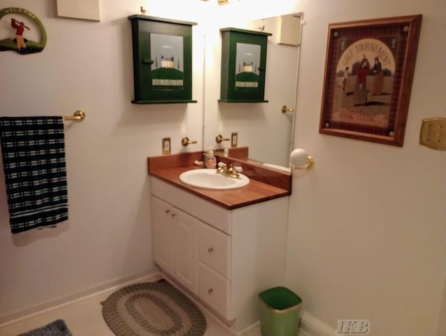 1726 Berkshire Dr, Gladwin, MI 48624 - bathroom with vanity and baseboards