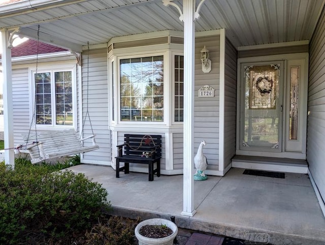 1726 Berkshire Dr, Gladwin, MI 48624 - property entrance with covered porch