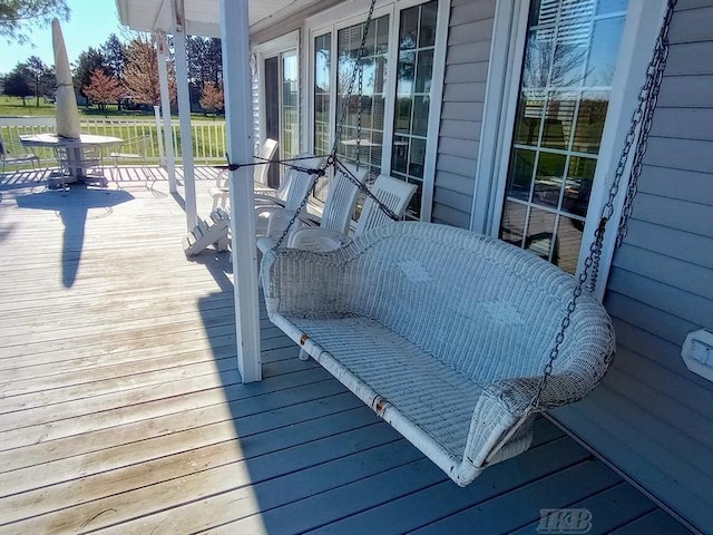 1726 Berkshire Dr, Gladwin, MI 48624 - wooden deck featuring a porch
