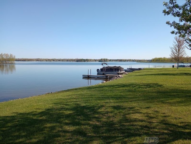 1726 Berkshire Dr, Gladwin, MI 48624 - dock with a yard and a water view