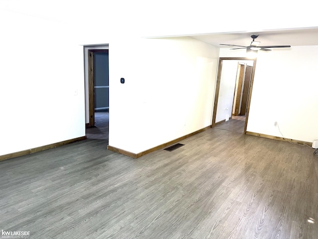 9602 Cornell Ave, Clarkston, MI 48348 - empty room with wood finished floors, baseboards, and a ceiling fan