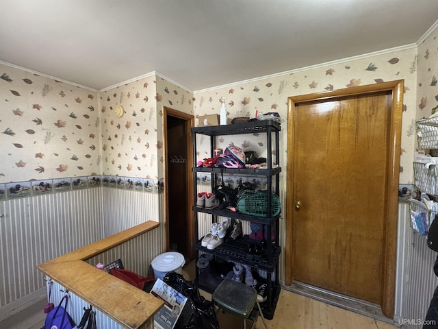 643 S Pine St, Ishpeming, MI 49849 - interior space featuring wallpapered walls, crown molding, and wood finished floors
